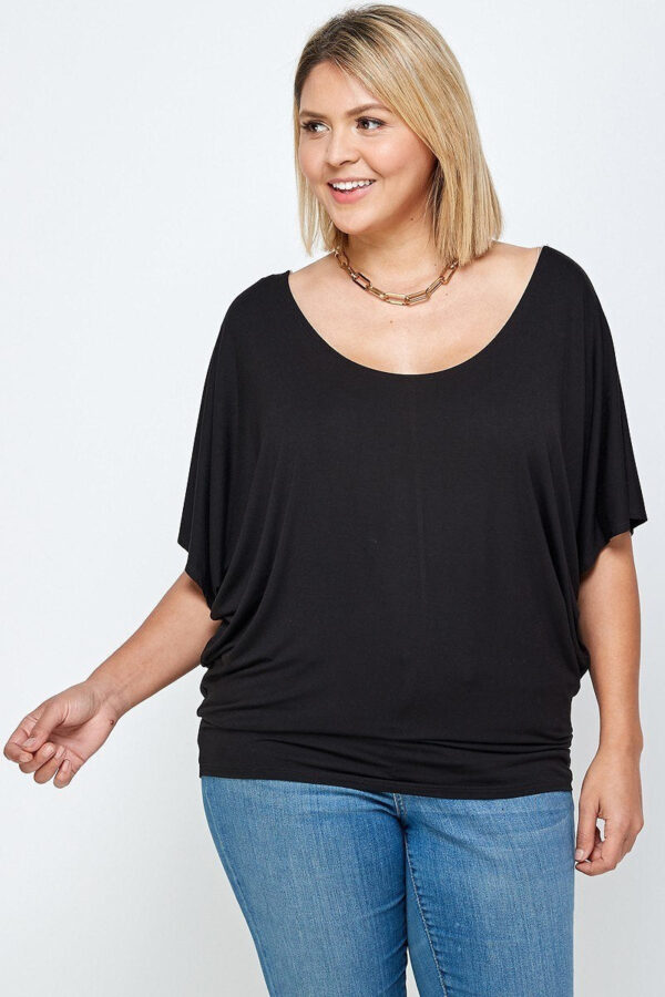 Plus Size Solid Knit Top With A Flowy Silhouette - Black