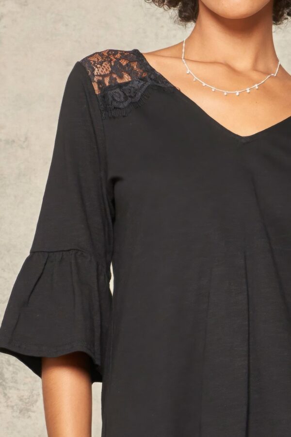 A Knit Top With Deep V Neckline And Yoke Design - Image 2