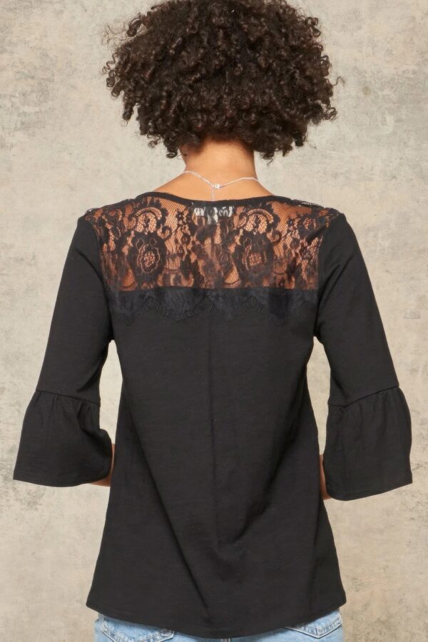 A Knit Top With Deep V Neckline And Yoke Design - Image 3